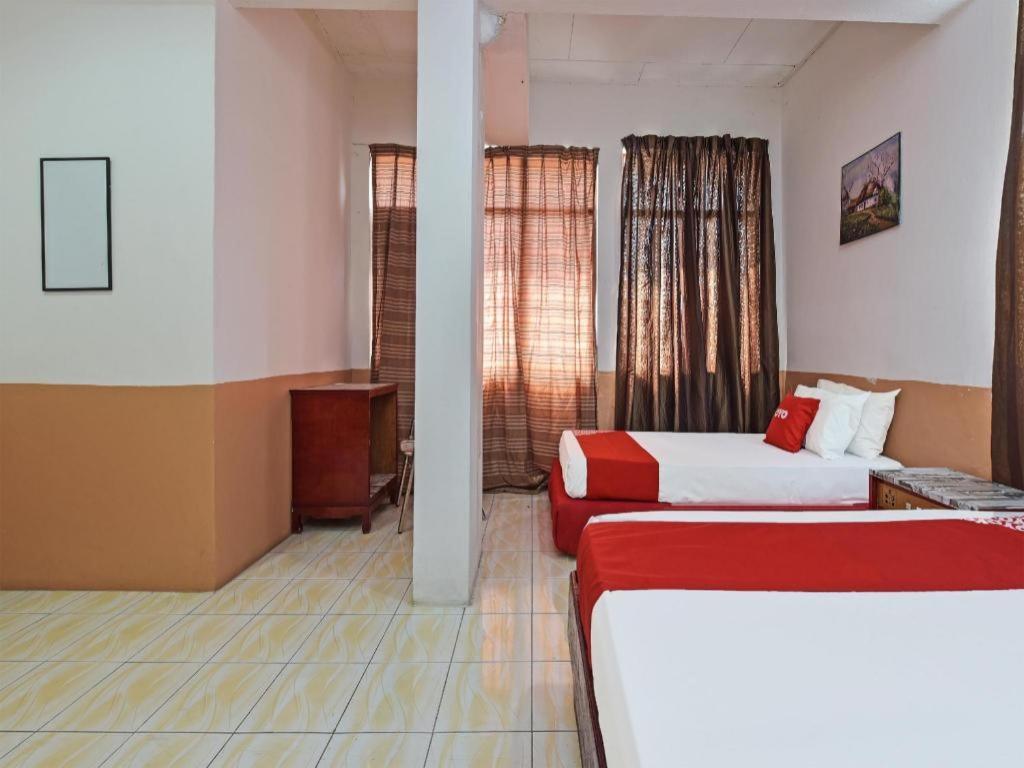 Super Oyo Capital O 90659 Raintown Timbers Hotel Taiping Bagian luar foto