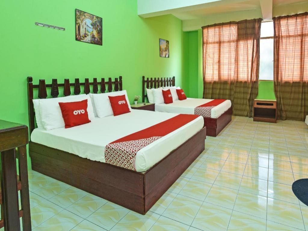 Super Oyo Capital O 90659 Raintown Timbers Hotel Taiping Bagian luar foto